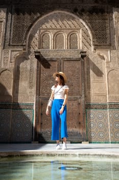 Young Woman in Hat at Bou Inania Madrasa, Fez, Morocco