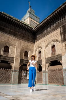 Young Woman in Hat at Bou Inania Madrasa, Fez, Morocco