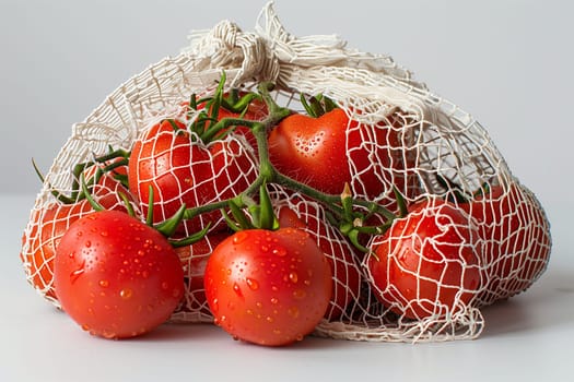 A bag brimming with ripe tomatoes rests on a wooden table.