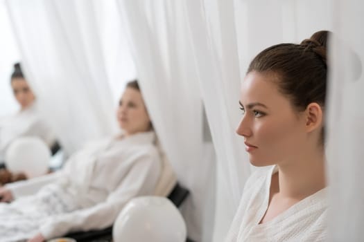 Portrait of young women relaxing in beauty salon