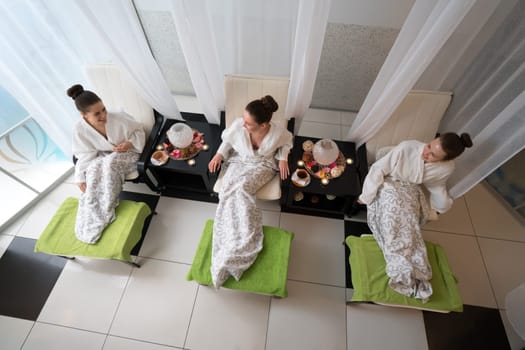 Top view of happy young women relaxing in beauty salon