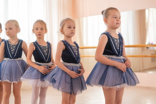 Little ballerinas perform at a dance school