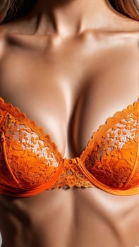 Fiery Orange Lace Bra A fiery orange lace bra with a bold energetic color featuring. Close up portrait in studio