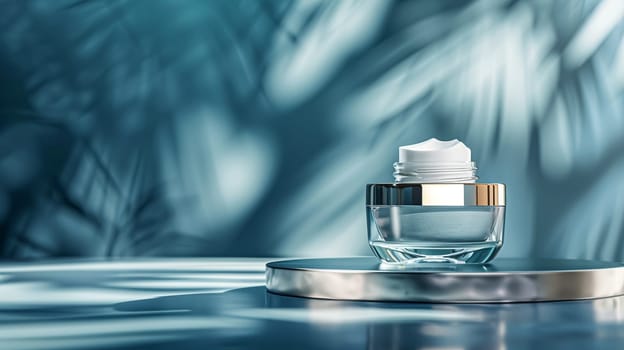 Cosmetic cream in a glass jar on a blue backdrop. Skin care concept. Background for beauty products