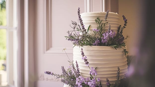 Wedding cake with lavender flowers. Festive table decoration.