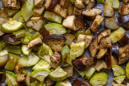 Fried eggplant, zucchini and pepper on a baking tray