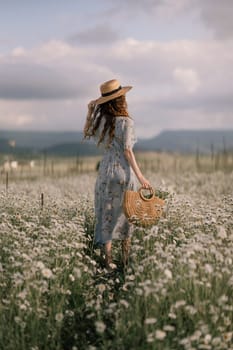 A woman is walking through a field of flowers, wearing a straw hat and carrying a basket. The scene is peaceful and serene, with the woman standing out against the backdrop of the colorful flowers