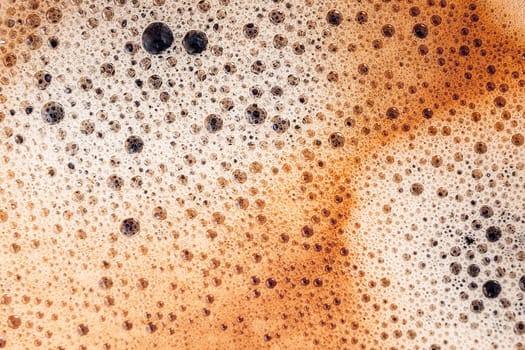 Coffee foam close up. Macro texture and background.