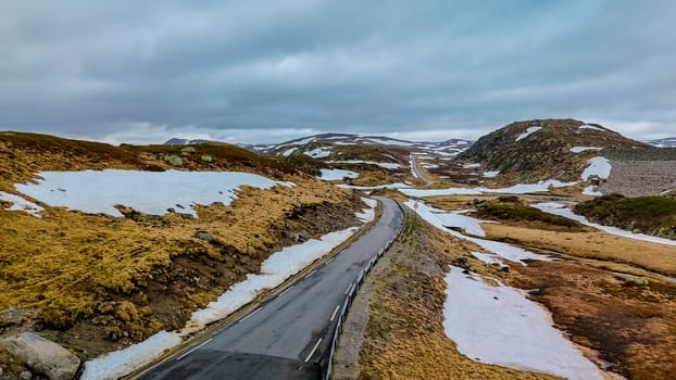 camper van RV at the Lyse road covered with snow to Krejag Norway Lysebotn, road covered with snow