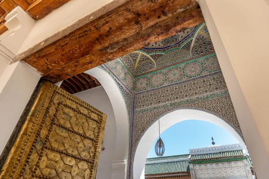 Al Attarine Madrassa Entrance Golden Door and Islamic Geometric Patterns in Fez, Morocco