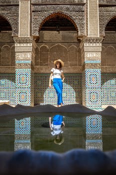 Young Woman in Al Attarine Madrassa, Stylish Visitor in Fez's Historic Site, Morocco