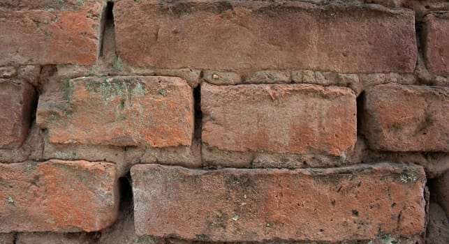 Old urban textured background .Horizontal view of empty, old, red brick wall background with copy space