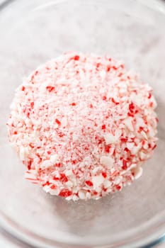 Measured ingredients in glass mixing bowls to make candy cane fudge.