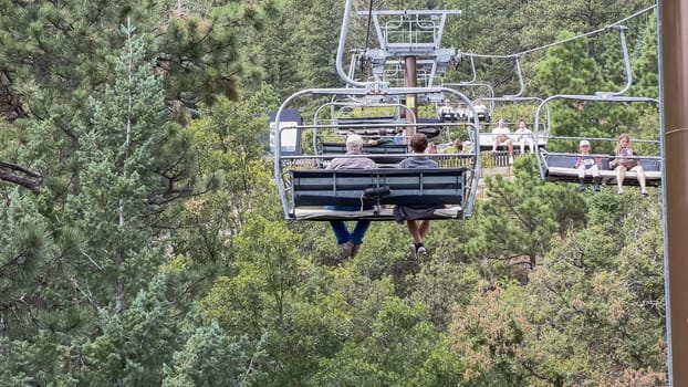 Colorado Springs, Colorado, USA-August 17, 2022-Ski lift ride at the Cheyenne Mountain Zoo during the summer.