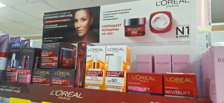 Bobruisk, Belarus - May 1, 2024: LOreal Paris skincare products, including Revitalift and Bloom, are neatly arranged on a store shelf, promoting their anti-aging and hydrating benefits.