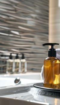 Closeup of stylish shampoo and conditioner bottles in a modern bathroom setting.