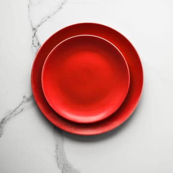 empty red plate on marble - recipe and restaurant mockup flatlay styled concept