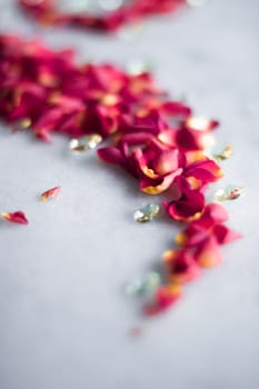 rose petals on marble flatlay - wedding, holiday and floral background styled concept, elegant visuals