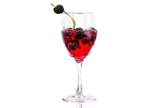 Cherry soda in a tulip glass cherries and blackberries around vibrant red splash glossy highlight. Drink isolated on transparent background.