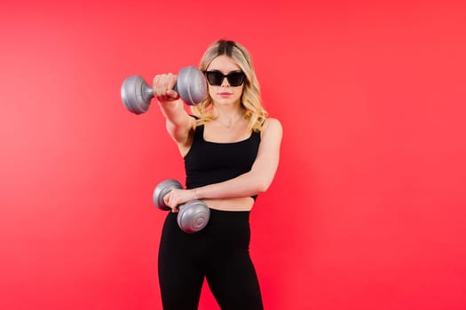 Woman, portrait and fitness, sunglasses and dumbbells, retro fashion accessory and muscle trainings