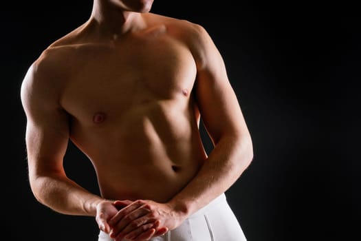 Portrait of man, bodybuilder and bicep flex in a studio, background and exercise for muscular power.