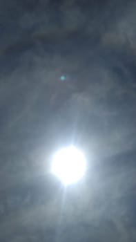 sun sky clouds rays of light background nature. High quality photo