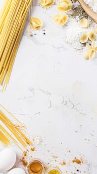 Pasta recipe preparation flatlay background with ingredients, spaghetti, olive oil, garlic, tomatoes and spices in the kitchen, homemade food recipe idea