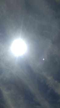 sun sky clouds rays of light background nature. High quality photo