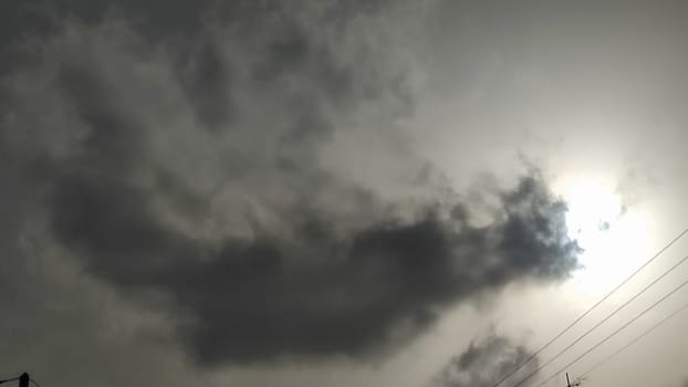 gray sky, clouds white sun, nature weather air background. High quality photo
