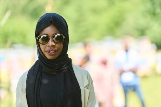 African American Muslim woman in hijab explores natural bee farms for honey production, blending tradition with sustainability in the serene countryside.