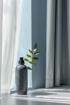 A bottle containing a plant is placed next to a window, basking in the natural light.