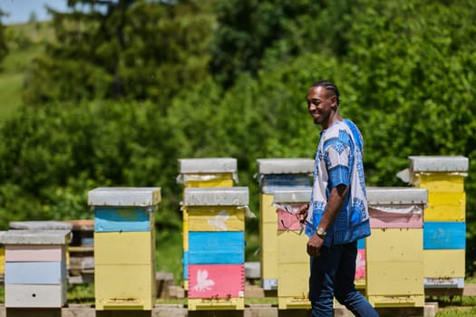 African American teenager clad in traditional Sudanese attire explores small beekeeping businesses amidst the beauty of nature