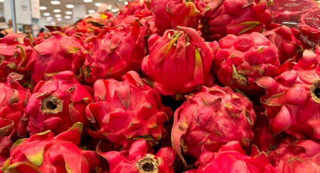 Fresh produce of dragon fruits or Hylocereus undatus 0r buah naga in Indonesian at the local market, healthy fresh fruit for salad or juice or any cooking options good for cooking recipes