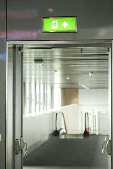 emergency exit door inside of a building .