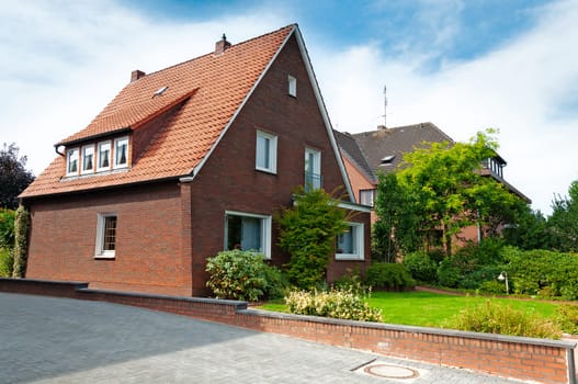Cozy german red house. Home exterior.