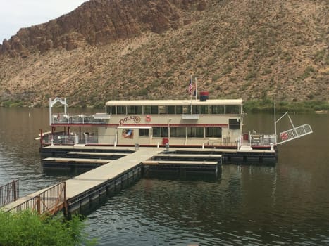 Boat by Pier on Canyon Lake, Arizona, Water in the Desert, Beautiful Landscape. High quality photo