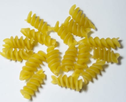 Close-up photo. Isolated corkscrew noodles. healthy food. Ingredient for Italian food. Selective focus image.