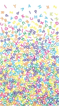Flying latin letters. Colorful childish scattered charachters of English alphabet. Foreign languages study concept. Back to school banner .