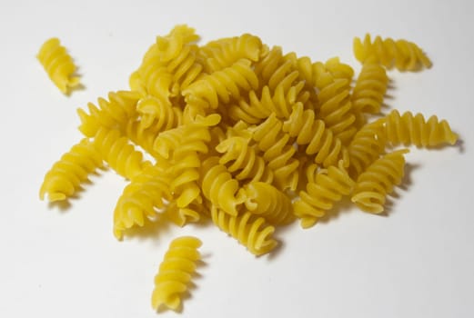 Close-up photo. Isolated corkscrew noodles. healthy food. Ingredient for Italian food.