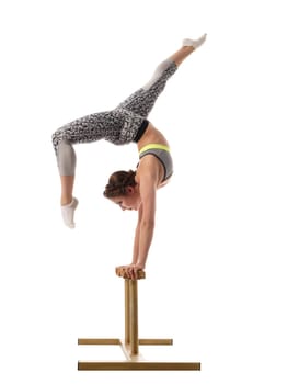 Image of female acrobat exercising on circus stands