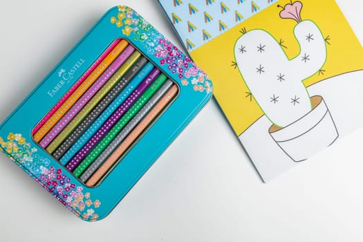 Faber-Castell colored pencils for drawing various colors andcoloring book for children. Copenhagen, Denmark - January 24, 2024