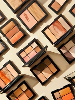 A flat lay showcasing various contouring and highlighting palettes with rich colors and elegant design.