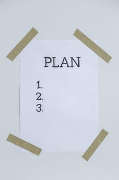 Motivational paper note PLAN. Goals setting concept. Strategy for self development improvement. Inspirational Planning better healthier life. Visual motivation