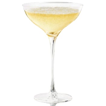 Stolzle Classic Champagne coupe shallow broad crystal bowl long stem effervescent golden liquid splashing motion. Close-up wine glass, isolated on transparent background