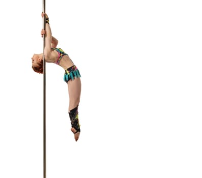 Sport and dance. Image of red-haired gymnast posing on pole