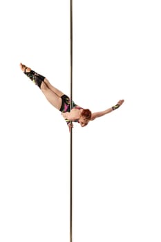 Gymnast dancing on pole. Isolated over white background