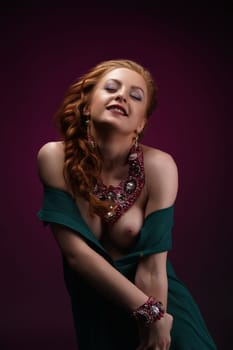 Erotica and luxury. Gorgeous model posing in jewelry