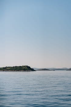 Rocky land under clear blue sky, mountains of Dugi Otok island in Adriatic Sea, Croatia