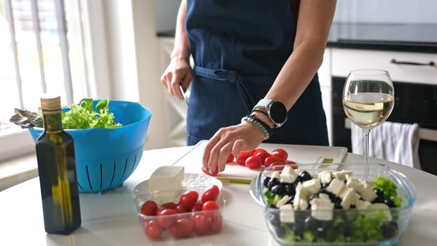 Housewife Puts Cheese In Bowl With Greek Salad Preparing Homemade Food