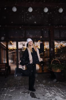 Portrait of a teenage girl outside a cafe in winter